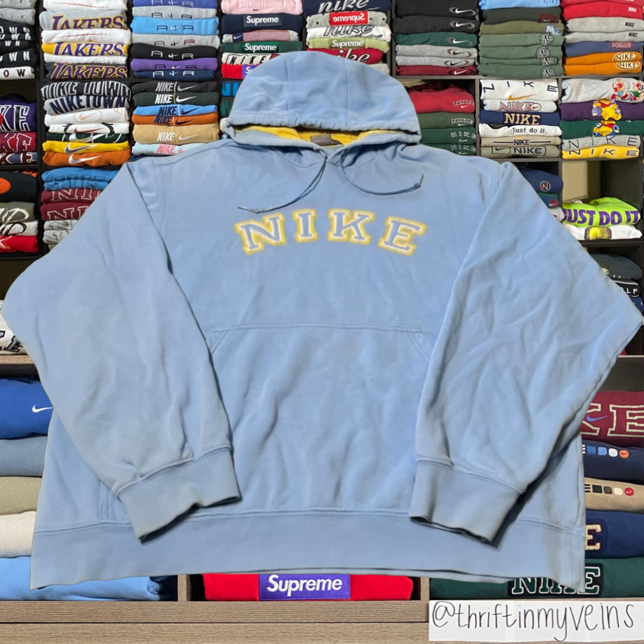 Y2K baby blue Nike spelled out hoodie