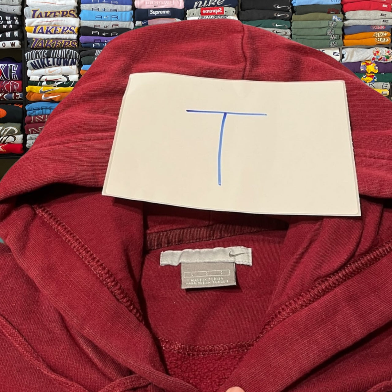 Y2K burgundy Nike spelled out hoodie